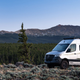 A photo of a Winnebago RV in the countryside.
